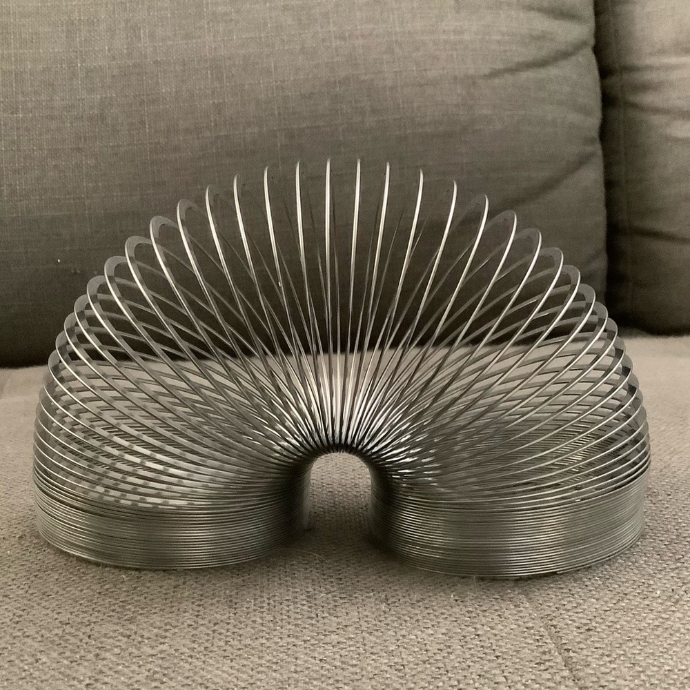 Original slinky metal toy walking spring toy brand new